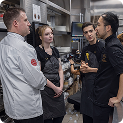 restaurant workers conversing